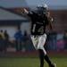 Lincoln senior quarterback Javin Kilgo throws in the first half against Chelsea High School on Friday. Lincoln lost 41-20. Daniel Brenner I AnnArbor.com